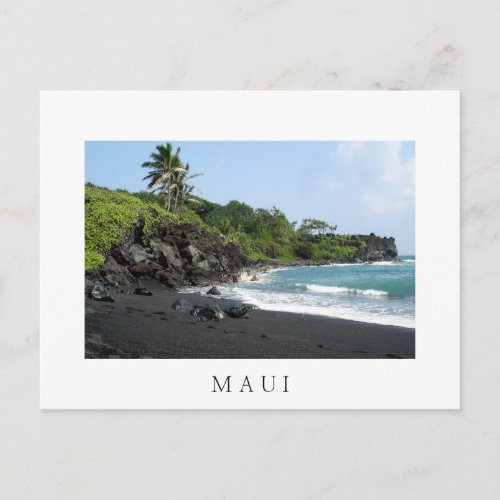 Volcanic black sand beach on Maui white postcard