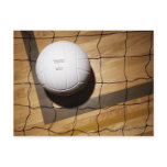 Volleyball and net on hardwood floor of postcard Volleyball and net on hardwood floor of postcard