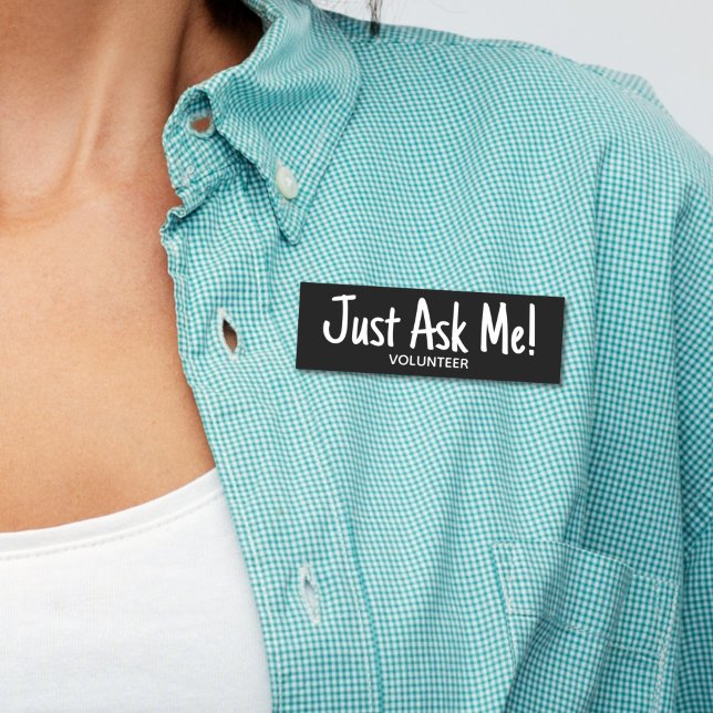Volunteeer Ask Me Black White Name Tag (Woman wearing blue shirt with  black "just ask me" volunteer name tag )