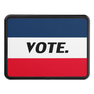 "Vote" black letters, red blue white trailer Hitch Cover