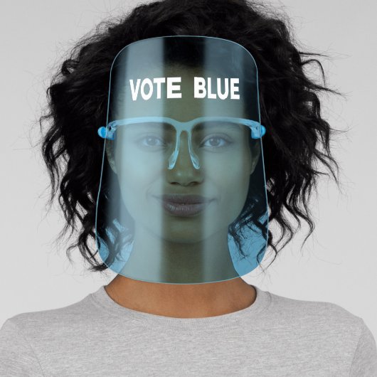 Vote Blue bold white text on Light Blue Tinted Face Shield (Insitu)