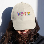 VOTE Democrat Harlequin Typograpghy  Trucker Hat<br><div class="desc">Make your voice resonate and inspire others to follow suit with our "VOTE" Democrat Trucker hat. This hat encourages women to take a stand, express themselves, and direct their future, turning it into more than just clothing—it’s a symbol of strength. With its bold "VOTE" graphic, it serves as a reminder...</div>