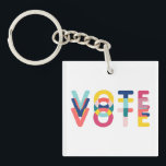 Vote Vibrant Rainbow Blue Orange Green Keychain<br><div class="desc">This vibrant, modern and rainbow colored vote design makes a wonderful gift for the politically involved person in your life. In blue, yellow, pink and orange.</div>