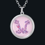 W monogram decorative letter necklace<br><div class="desc">Pretty hearts and flowers letter W monogram pendant. Whimsical letter drawing of the capital initial letter W ideal for gifting girls with a name that begins with W. Background color can be changed if required,  currently light pink. © Original drawing and design by Sarah Trett www.sarahtrett.com for www.mylittleeden.com</div>