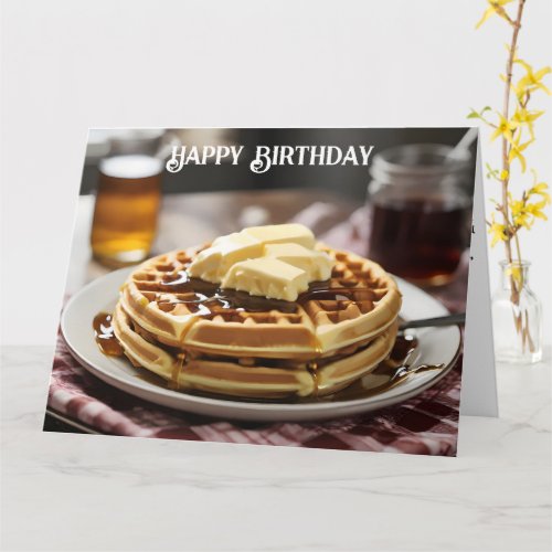 Waffles on plate with syrup and button ontop card