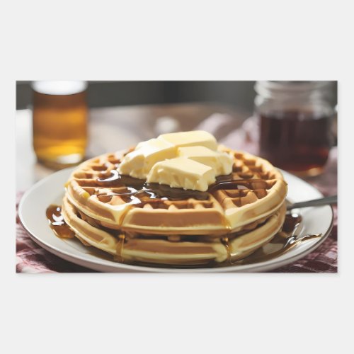 Waffles on plate with syrup and button ontop rectangular sticker