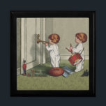 Wake Up Its Christmas cute child illustration Keepsake Box<br><div class="desc">Vintage Wake up It's Christmas - a cute old fashioned illustration Christmas for children! This is based on an old-fashioned postcard from 1918. Sweet little toddlers up at the crack of dawn announcing to Mom and Dad that Christmas is here! Children are standing outside mommy and daddy's bedroom door. One...</div>