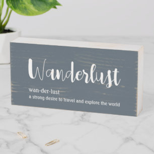 Wanderlust definition white grey blue colour wooden box sign