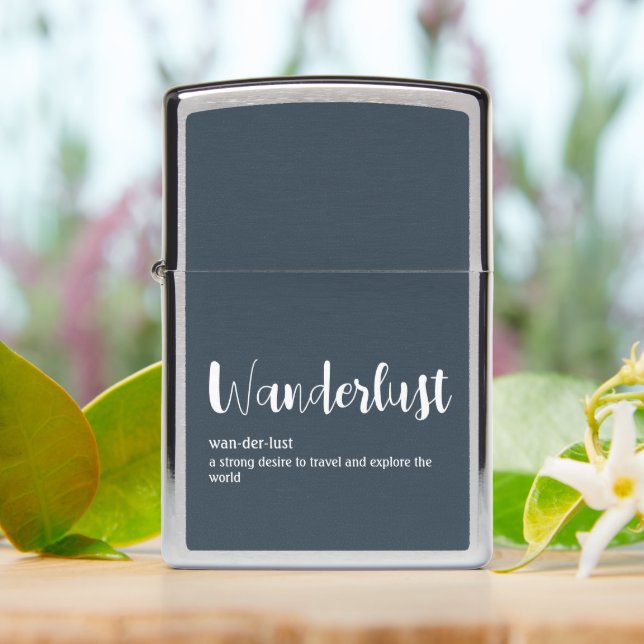 Wanderlust definition white grey blue colour zippo lighter (On Table)