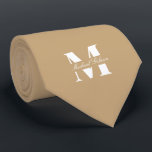 Warm Tan | Custom Monogram Wedding Groomsmen  Neck Tie<br><div class="desc">Elevate your wedding day or special occasion look with this Elegant Monogram and Custom Name Neck Tie. This is the ultimate accessory for the groom and his entire wedding party, offering a stylish and sophisticated way to ensure everyone's look is coordinated and personal. Featuring a bold, classic white monogram initial...</div>