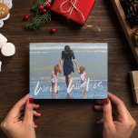 Warm Wishes Beach Family Photo Christmas Card<br><div class="desc">Christmas greeting card in a beach-inspired "warm wishes" photo design. Customized with your photo and your family's name. This beach Christmas card reverses to a blue and white nautical stripe design on the back.</div>