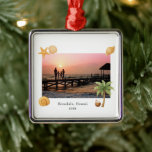 Warmest Wishes Beach Photo Modern Christmas Metal Ornament<br><div class="desc">Modern Christmas ornament featuring a simple and fun design with a starfish,  palm tree,  coconut drink and seashells accenting your favorite beach photo along with optional text.</div>
