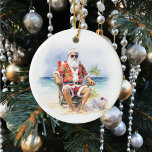 Warmest Wishes Santa at the Beach Ceramic Ornament<br><div class="desc">This design was created though digital art. It may be personalized in the area provided by changing the photo and/or text. Or it can be customized by choosing the click to customize further option and delete or change the color the background, add text, change the text color or style, or...</div>
