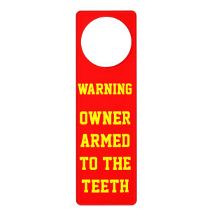 WARNING OWNER ARMED TO THE TEETH DOOR HANGER