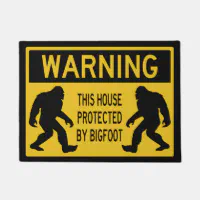 https://rlv.zcache.com/warning_this_house_protected_by_bigfoot_doormat-r60f739f65c564b5d968af1ad279c90d1_jftbl_200.webp?rlvnet=1