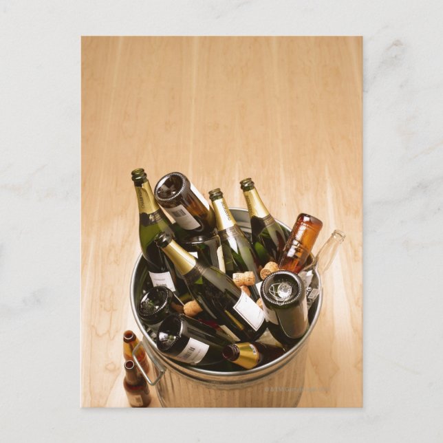 Waste bin full of empty champagne bottles on postcard (Front)