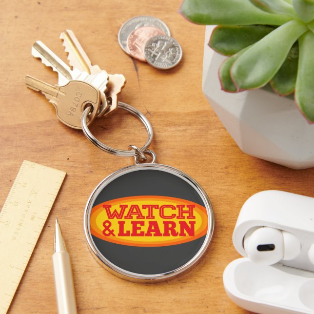 Watch & Learn Radial Oval Keychain (Desk)