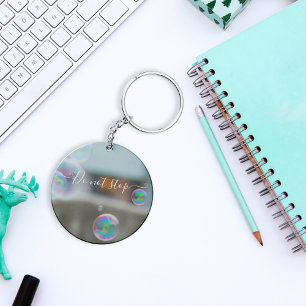 Water bubbles on glass keychain. keychain