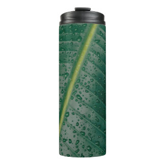 Water droplets on banana leaf thermal tumbler