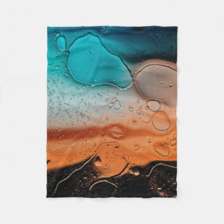 Water droplets on glass panel fleece blanket