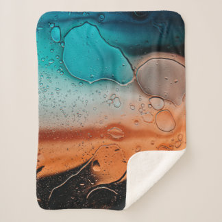 Water droplets on glass panel sherpa blanket