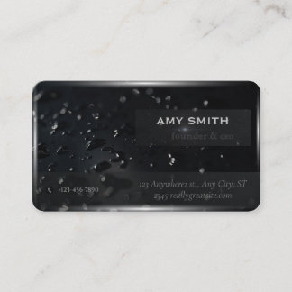 Water droplets on the background of black space business card