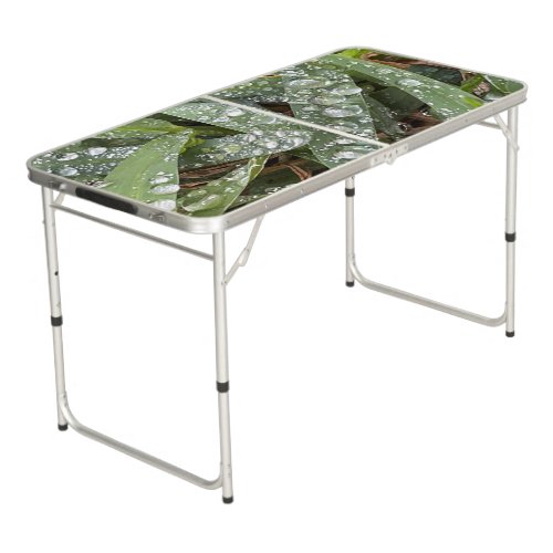 Water drops on grass  beer pong table