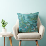 Water Lilies, Fine Art Oil Painting, Claude Monet Throw Pillow<br><div class="desc">Claude Monet,  circa 1915
oil on canvas
mostly monochrome impressionist oil painting of a peaceful calm serene tranquil bold jewel tone vibrant vivid turquoise blue pond with green lily pads and pink water lily flowers 

sophisticated boho elegant stately bohemian chic fine art decor modern classic historical nature art</div>