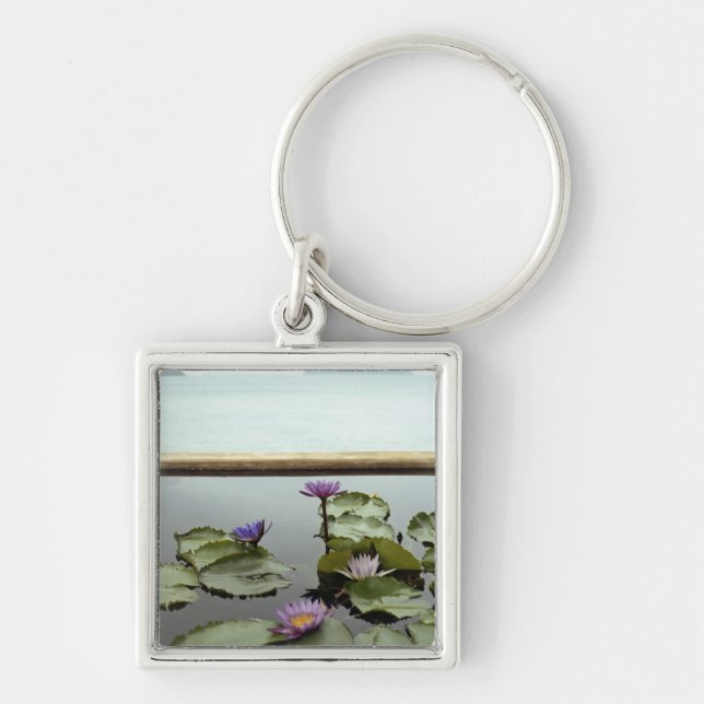 Water lilies in pond by ocean keychain (Front)
