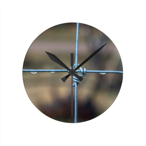 Water On The Fence Round Clock