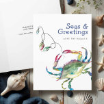 Watercolor Beach Christmas Cards Blue Crab<br><div class="desc">These seashore holiday greetings feature a watercolor blue crab in nautical and colorful shades. The words "seas and greetings" are set in fun typography. These ocean-themed Christmas cards open to reveal your custom greeting. Use the template fields to add your personalized text. A coastal choice for Christmas greetings. To see...</div>