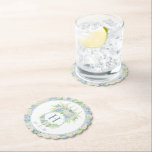 Watercolor Blue and White Hydrangea Crest Paper Coaster<br><div class="desc">Set the prettiest table for your magical evening in the garden with these gorgeous watercolor blue and white hydrangea floral wedding crest coasters. These look fabulous in at the bar or sprinkled around the reception, and make a lovely keepsake to smuggle home! With this suite, every insert is more deliciously...</div>