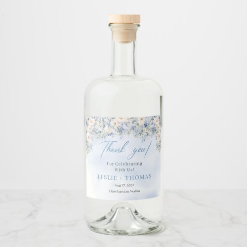 Watercolor blue hydrangea white roses eucalyptus liquor bottle label