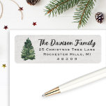 Watercolor Christmas Tree Return Address Label<br><div class="desc">A softly painted watercolor pine tree pairs with elegant family name script on this charming Christmas return address label. The address appears below in classic serif caps for a refined,  woodland-inspired finishing touch on your holiday mailings. The name and address are easy to personalize.</div>