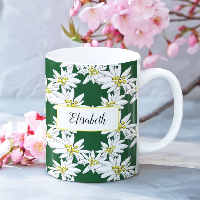 Watercolor Edelweiss Hand-Illustrated Personalized Coffee Mug (This Edelweiss floral mug features white wildflowers on a forest green as well as script typography.)