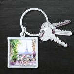 Watercolor Eiffel Tower Paris French Cafe Keychain<br><div class="desc">Watercolor Eiffel Tower Paris French Cafe Keychain features a watercolor french cafe seating area with Paris and the Eiffel Tower in the background. Created by Evco Studio www.zazzle.com/store/evcostudio</div>