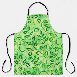 Watercolor green leaves on a yellow-green backgrou apron