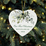 Watercolor Greenery Our First Christmas Heart Ceramic Ornament<br><div class="desc">Modern Elegant Watercolor Greenery Couple Heart Ornament includes beautiful watercolor botanical greenery,  eucalyptus leaves and other beautiful foliage.</div>