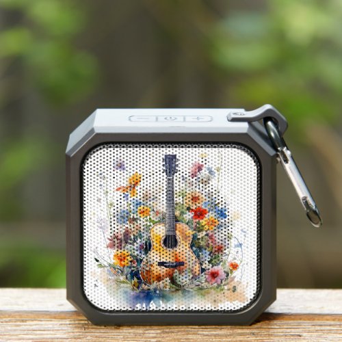 watercolor guitar surrounded with colorful flowers bluetooth speaker