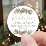 Watercolor Holly Christmas Return Address Label<br><div class="desc">Add an elegant finishing touch to Holiday greeting cards or invitations with these artistic watercolor round return address labels.  Design features rustic vintage holly branches and berries and stylish gold script typography on a simple white background.  Merry Christmas! Gold is printed non-metallic color,  not foil.</div>