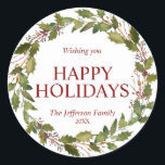 Watercolor Holly Leaves Wreath Christmas Holidays Classic Round Sticker<br><div class="desc">Lovely festive hand painted watercolor wreath holly in green and deep red berry colors.  Easy to edit  text.  HAPPY HOLIDAYS or MERRY CHRISTMAS & HAPPY NEW YEAR.  Makes great cards to send to family and friends during the holiday season - great keepsake!</div>