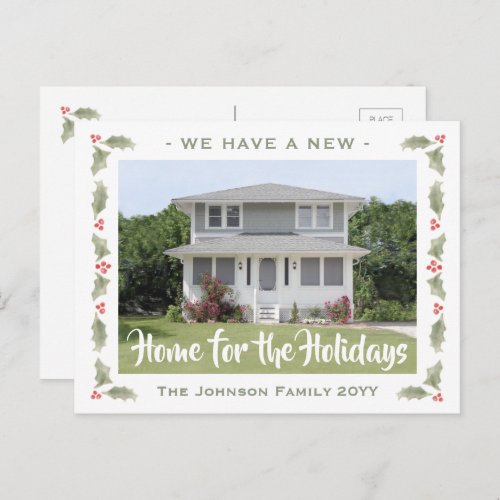 Watercolor Holly New Home Photo Holiday Moving Announcement Postcard - Share the joyful news of moving to your new home with this elegant change of address holiday postcard. All text can be customized.  Personalize for s single person by changing the top line to "I Have A New".  Design features artistic watercolor red and green holly leaves and berries framing your photo. Stylish vintage and calligraphy script typography are simple to customize.  This new address announcement Christmas card is a modern and chic way to introduce friends and family to your new home. Happy Holidays!