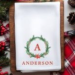 Watercolor Holly Wreath Modern Holiday Christmas Kitchen Towel<br><div class="desc">Watercolor Holly Wreath Modern Holiday Christmas hand towel. The perfect kitchen decor for the holidays. Personalize this custom design with your own monogram initial and family name.</div>