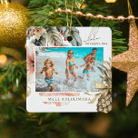 Watercolor Mele Kalikimaka Hawaiian Photo  Ceramic Ornament<br><div class="desc">Modern holiday ornament features "Mele Kalikimaka, " the Hawaiian Christmas greeting,  with watercolor tropical foliage,  exotic hibiscus flowers,  baubles and a gold ribbon pineapple framing your favorite beach or vacation photo. All text is easily customized using the template provided.</div>
