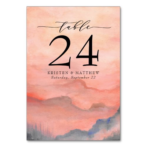 Watercolor Mountain Rustic Coral Sunset Table Number - When it comes to wedding stationery, woodland styles kick off the theme for a magical evening or an entire wedding weekend in the mountains Set the tone of your rustic wedding with this mountain-inspired design featuring a watercolor mountain scene background with pine trees.