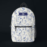 Watercolor Navy Wildflowers Custom Monogram Name Printed Backpack<br><div class="desc">Get ready for school in style with the "Watercolor Navy Wildflowers Custom Monogram Name Printed Backpack." This charming backpack features a beautiful design of navy blue wildflowers against a crisp white background, offering a blend of elegance and natural beauty. The custom monogram and script name add a personal touch, making...</div>