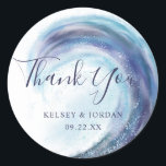 Watercolor Ocean Wave Wedding Thank You Favor Classic Round Sticker<br><div class="desc">These beautiful wedding favor stickers feature a hand painted ocean wave in various hues of blue,   purple,  aqua / teal,  black,  and gray. Easy to personalize for your special day! For custom design or product requests,  please contact me (Tracey) at orabellaprints@outlook.com.</div>
