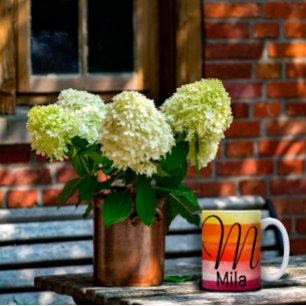 Watercolor orange letter M name coffee mug