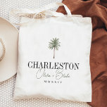 Watercolor Palm Destination Wedding Welcome Tote Bag<br><div class="desc">Welcome guests to your destination wedding with these chic and modern personalized tote bags. Design features a watercolor palm tree illustration with your wedding destination beneath (shown with Charleston) in classic serif lettering. Add your names beneath in dark green handwritten cursive script, as well as the year (shown in Roman...</div>