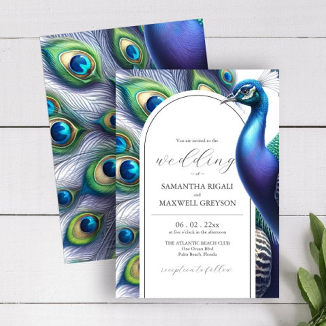 Watercolor Peacock Wedding Invitations (Watercolor peacock wedding invitation in shades of purple blue and green by Do Tell A Belle)